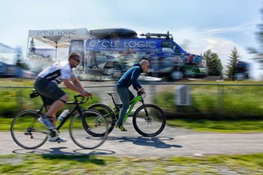 two men riding their bikes