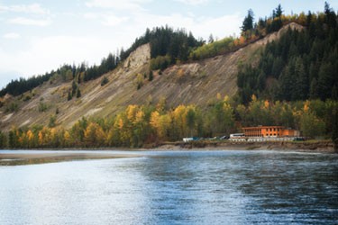 view of the river beneath the mountains